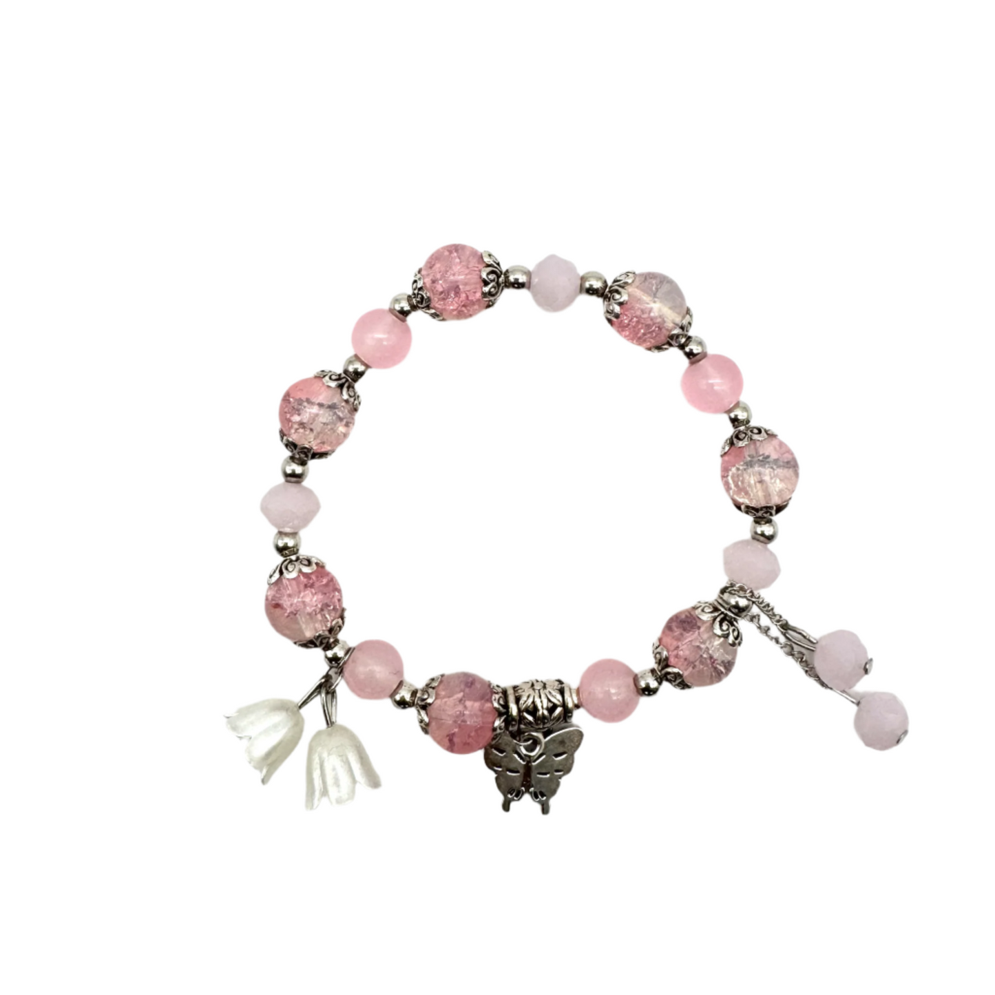 Roze kralen stretch armband met zilveren spacers en vlinder bedel